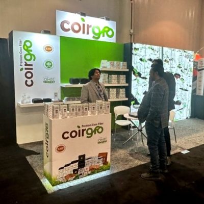 Executive trade show booth with proof-of-trust branding panel