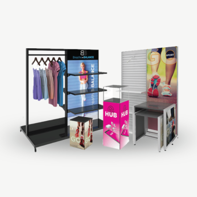 Custom modular retail display with SEG graphics, shelving, and accessories.