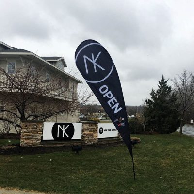 Flying teardrop banners boosting visibility in all weather.